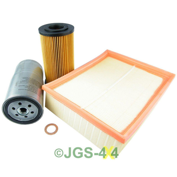 Direct Replacement Range Rover P38 2.5DT Engine Service Filter Kit Oil Air Fuel Filters, image of oil filter, air filter, fuel filter, and a gasket.