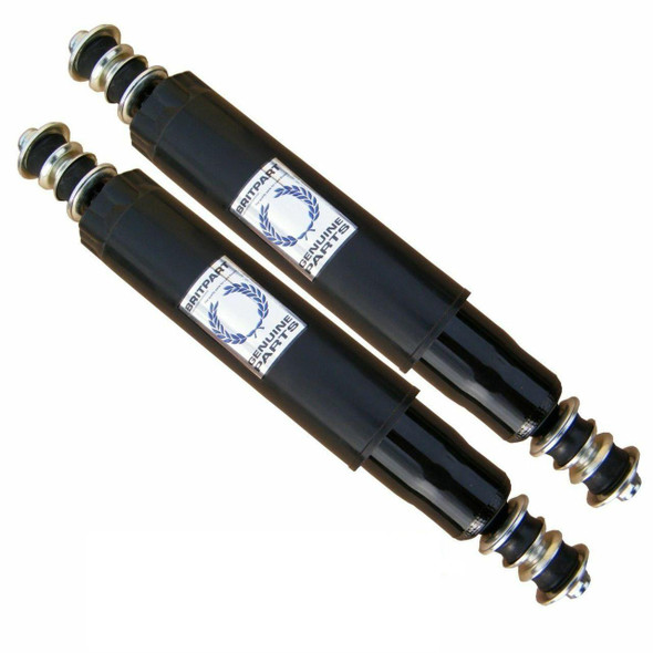 Product: Direct Replacement Shock Absorber Front x2 for Defender 90, image showing two black shock absorbers with metal mounts and white label.