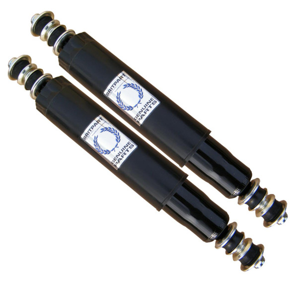 Direct Replacement Pair of Front Shock Absorber Dampers for Discovery 1 (1989-1994), black shock absorbers with metal coil spring components and labels indicating genuine parts