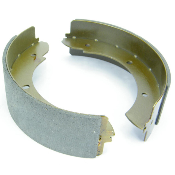 Direct Replacement Handbrake Brake Shoe Set for Defender & Discovery 1, gold-colored brake shoes with textured friction surface.