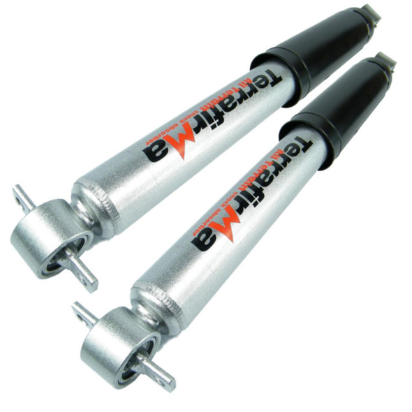 Terrafirma Pair of Terrafirma All-Terrain Front Shock Absorbers for Discovery 2, durable silver shock absorbers with black mounting ends, designed for off-road performance.
