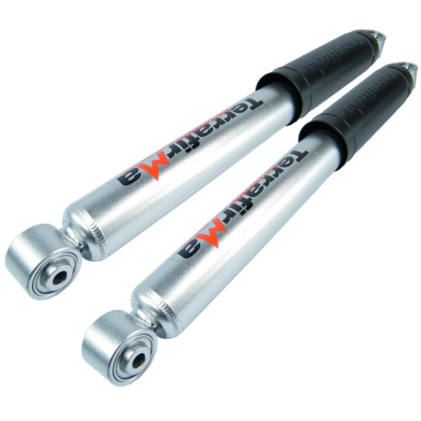 Terrafirma Pair of Terrafirma All-Terrain Rear Shock Absorbers for Discovery 2, durable silver shock absorbers with black protective covers and branding, designed for off-road vehicle suspension.