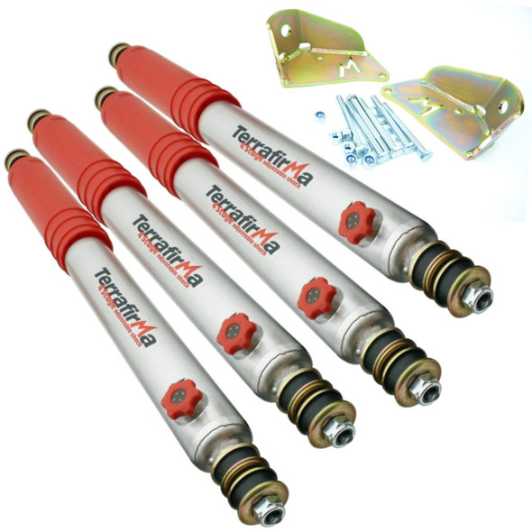 Terrafirma Set of Four 4 Stage Adjustable Shock Absorbers with Rear Upper Mounting Brackets for Defender & Discovery 1, image showing four shock absorbers with red springs and mounting brackets.