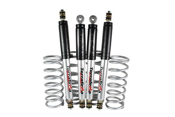 Terrafirma Coil Spring & Shock Absorber Suspension Kit +2" Lift Kit Med Load for Defender 90, image of four shock absorbers with coil springs for off-road vehicle suspension upgrade.