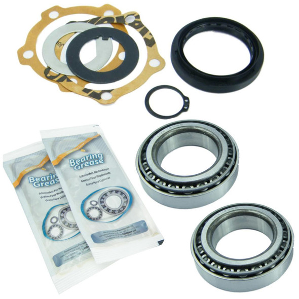 Direct Replacement Wheel Bearing Kit STC4382 for Defender, automotive wheel bearing repair kit with bearings, seals, grease packets, and installation hardware.
