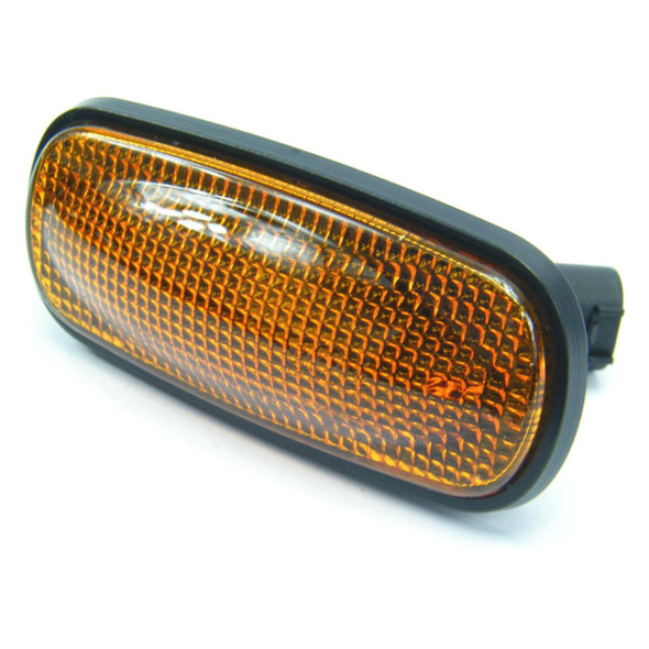 Product: Direct Replacement Side Indicator Amber Repeater Lamp for Freelander 1, Defender, and Discovery 2, image of the amber side indicator lamp with black casing and reflective textured surface.