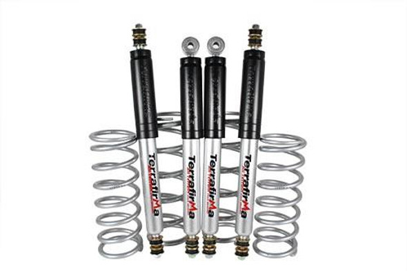 Terrafirma All-Terrain Medium Load Suspension Kit with 2-inch Lift for Defender 110/130, featuring black shocks and silver coil springs.