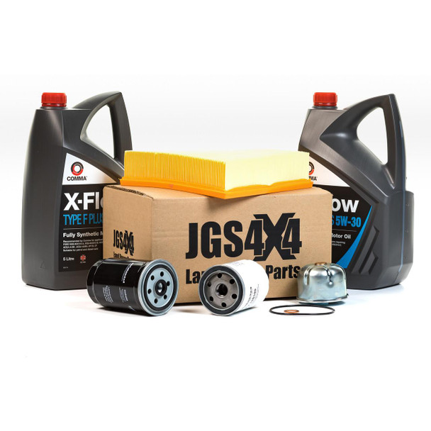 Direct Replacement Engine Service Filter Kit & X-Flow Fully Synthetic Engine Oil for Defender Td5, automotive oil filters, synthetic oil bottles, and filter components arranged together.