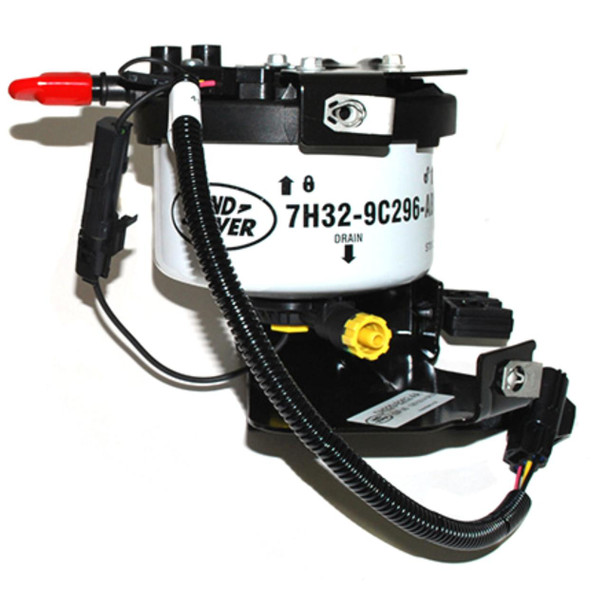 Genuine Land Rover Fuel Filter Housing With Filter & Water Sensor for Range Rover Sport L320, close-up of the fuel filter assembly with water sensor and connecting hoses.