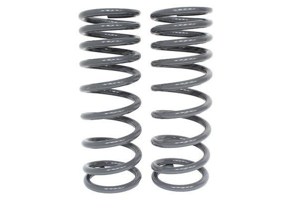 Terrafirma Heavy Load Rear Springs 2 Inch Lift for Defender 90, Discovery 1 & Discovery 2, image of heavy-duty grey coil springs designed for off-road vehicle suspension upgrade. Terrafirma Heavy Load Rear Springs 2 Inch Lift for Defender 90, Discovery 1 & Discovery 2, image of heavy-duty grey coil springs designed for off-road vehicle suspension upgrade.