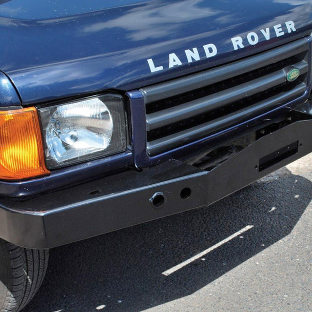 Britpart Heavy-Duty Steel Front Winch Bumper for Discovery 2, black steel bumper mounted on a navy blue Land Rover Discovery 2 vehicle.