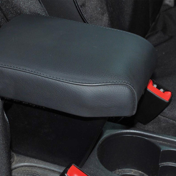 Britpart Stylish Black Real Leather Cubby Box & Armrest for Freelander 2 | DA5101, the image shows a close-up of a black leather armrest with a textured surface in a vehicle interior.