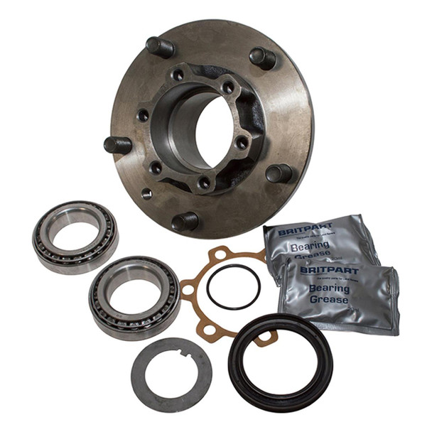 Britpart Wheel Hub and Wheel Bearing Kit for Series 3, metal wheel hub, bearings, seals, gaskets, and bearing grease in packaging.