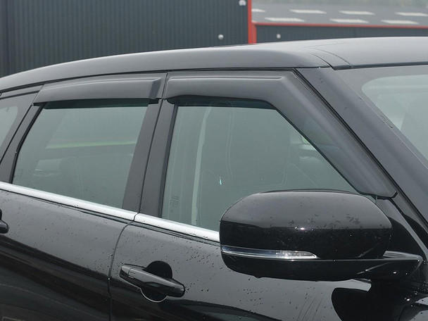 Britpart Window Wind Deflector Set for Range Rover Evoque, close-up image of the black wind deflectors installed on the vehicle side windows.