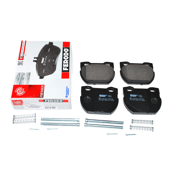 Ferodo Rear Brake Pad Set for Defender 110/130 (2002-2016), image of black brake pads with installation hardware on a white background.