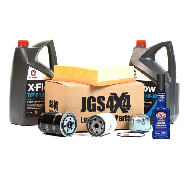 Product: Direct Replacement Engine Service Filter Kit for Defender Td5, image description: automotive filters, synthetic engine oil, fuel treatment, and related car maintenance parts arranged with filters, oil bottles, and a box.