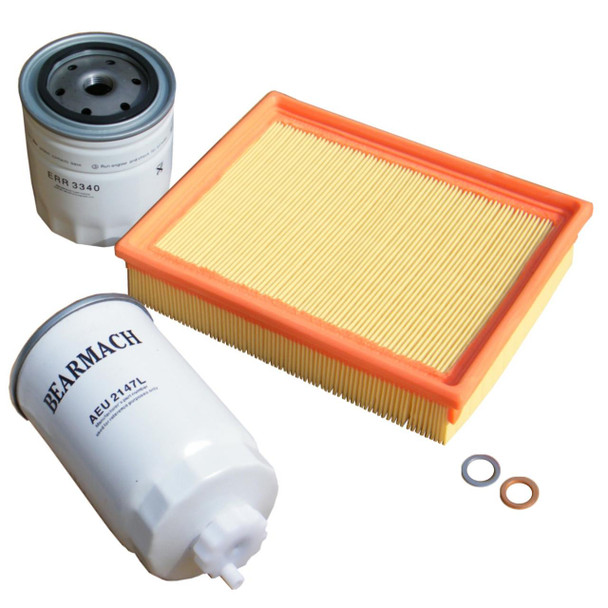 Direct Replacement Service Filter Kit Oil Air Fuel for Discovery 1 300TDi, car maintenance filters, including oil filter, air filter, and fuel filter with orange rubber seals. Direct Replacement Service Filter Kit Oil Air Fuel for Discovery 1 300TDi, car maintenance filters, including oil filter, air filter, and fuel filter with orange rubber seals.