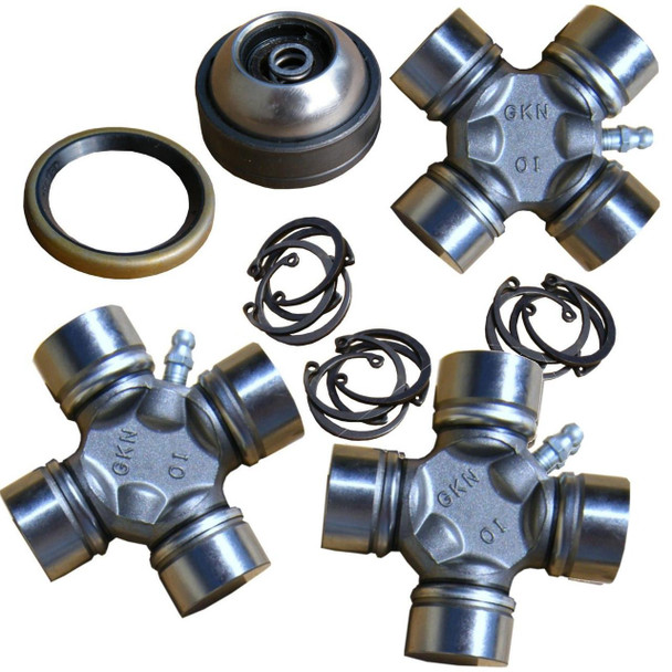 GKN Front Propshaft Heavy-Duty Repair Kit for Discovery 2, includes metallic repair joints, rubber seals, snap rings, and a bearing.