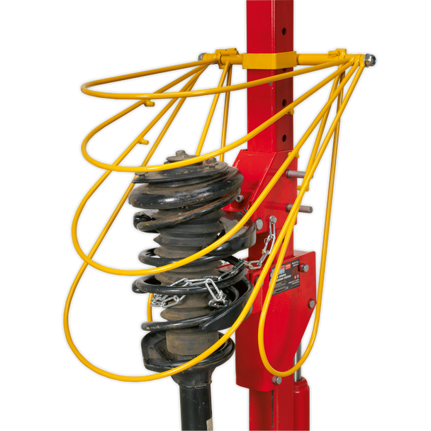 Restraint System for Coil Spring Compressors