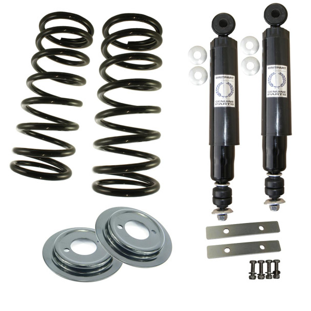 Direct Replacement Rear Standard Suspension Kit for Defender 90, includes coil springs, shock absorbers, mounting plates, and bolts for 1986-1999 Land Rover Defender 90