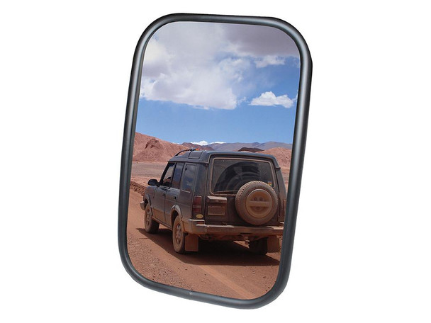 Direct Replacement High-Quality Replacement Wing Mirror for Defender, car mirror reflecting a dusty off-road vehicle in a desert landscape. Direct Replacement High-Quality Replacement Wing Mirror for Defender, car mirror reflecting a dusty off-road vehicle in a desert landscape.