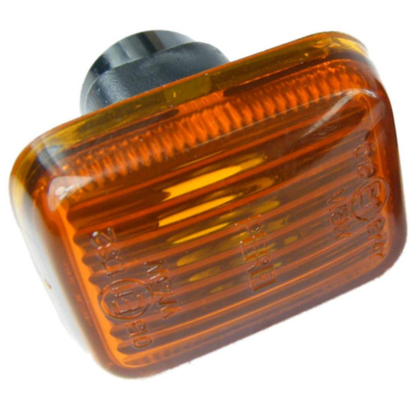 Direct Replacement Side Indicator Repeater Lamp Amber Square for Defender, close-up of amber rectangular side indicator repeater lamp with textured lens surface.