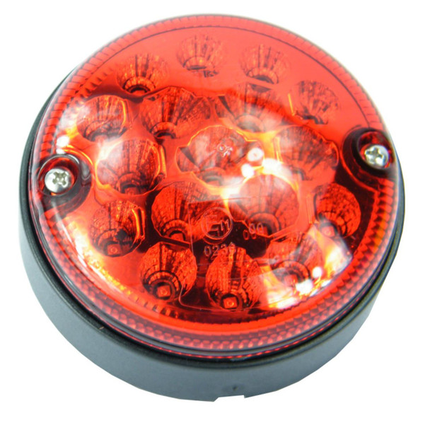WIPAC LED Fog Light 95mm NAS Style Lamp WIPAC, round automotive fog light with red lens and multiple LED bulbs for Defender vehicles.