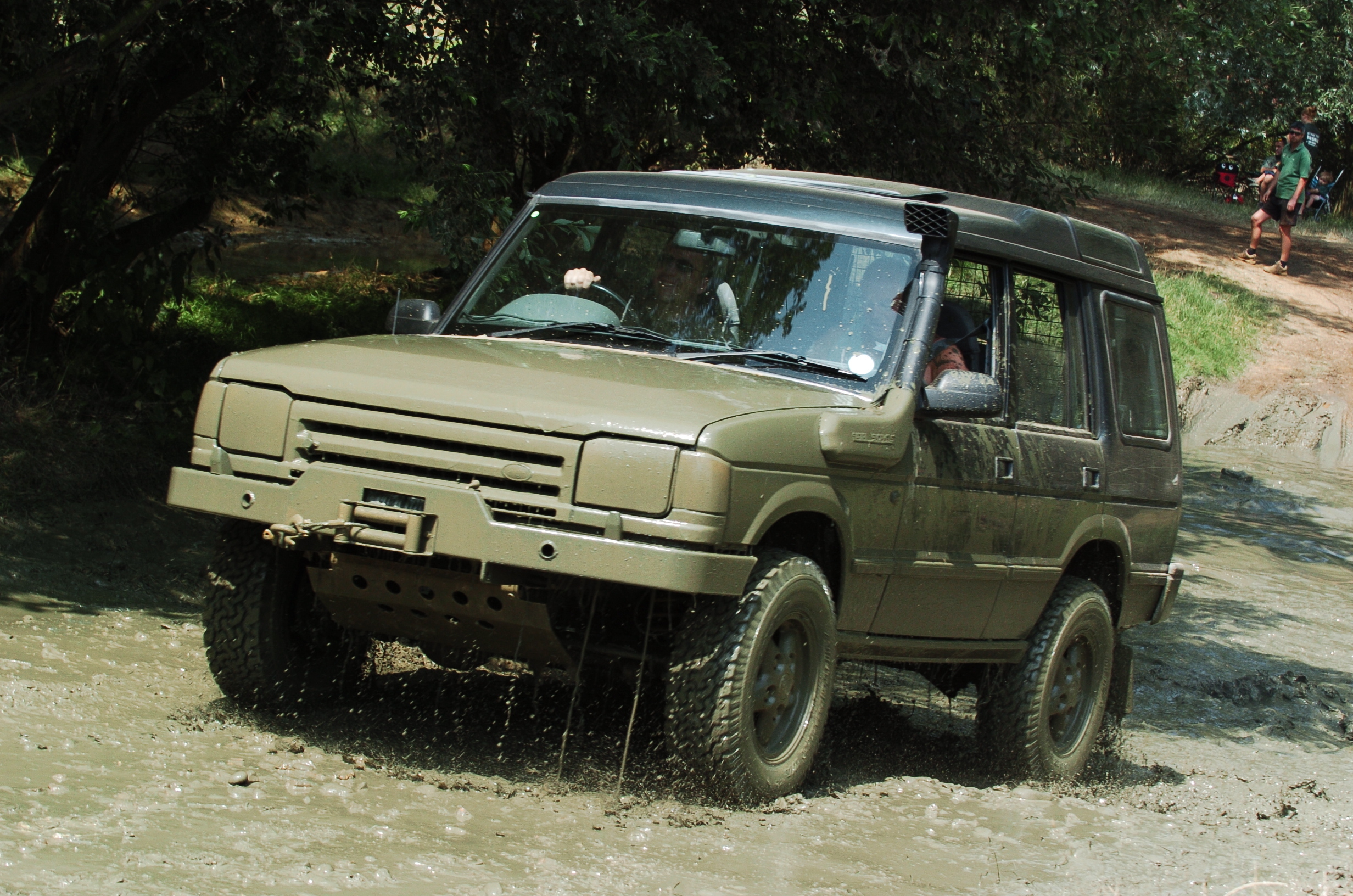 JGS4x4 family Land Rover Discovery 1 being used off road in muddy conditions