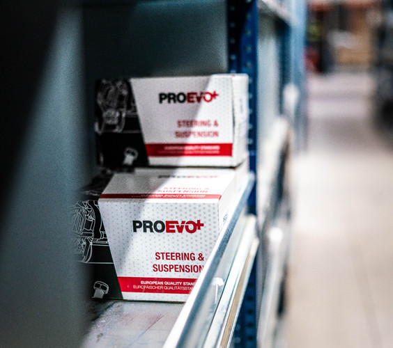 ProEvo Plus steering and suspension components displayed inside the specialist parts warehouse