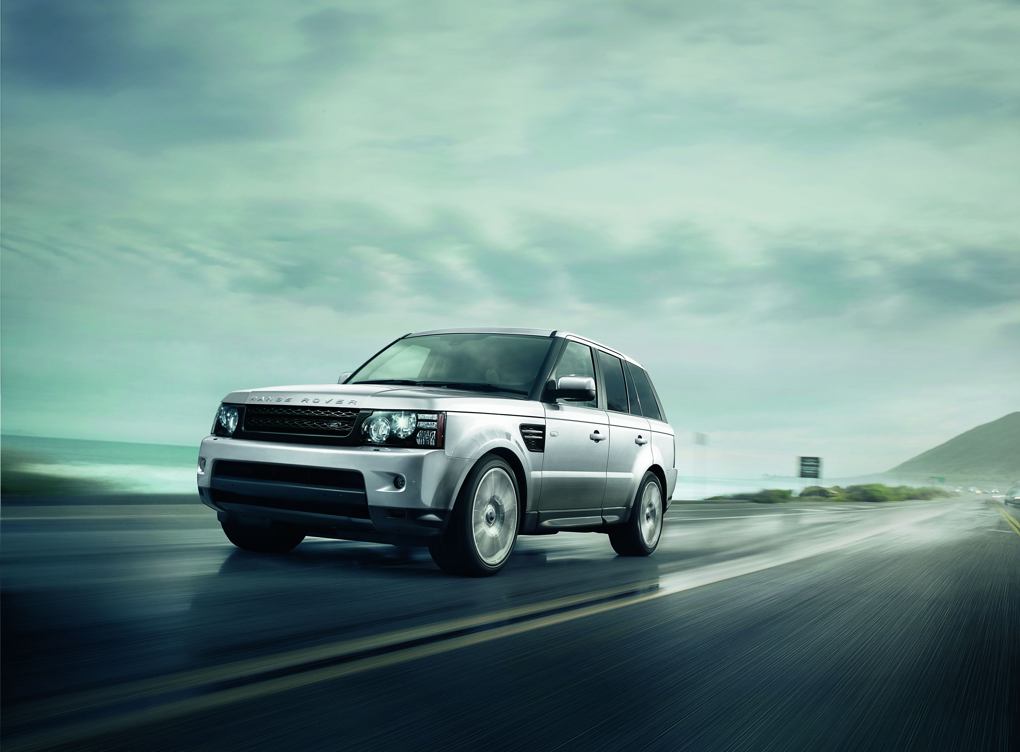 Range Rover Sport L320 facelift model driving on the road