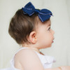 Beautiful big bow on a baby with our no-slip hair clips