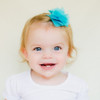 Our Molly chiffon flower hair clip is so cute on babies and big girls! Shown on a bitty clip in tuqruoise.