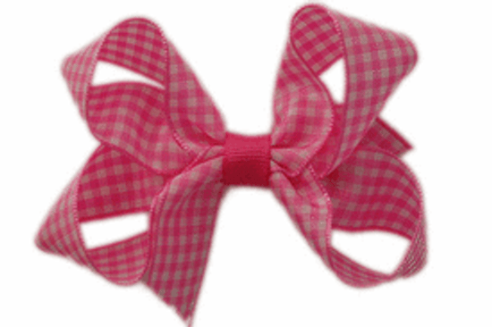 Pink gingham loopy hair bows for toddlers and babies! The no-slip clip for this boutique bow is the velvet gator which has a solid but soft close for fine hair.