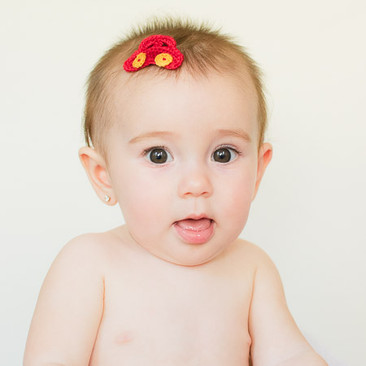 Our Carmen crocheted car hair clippie stays in the tiniest amount of baby fuzz!