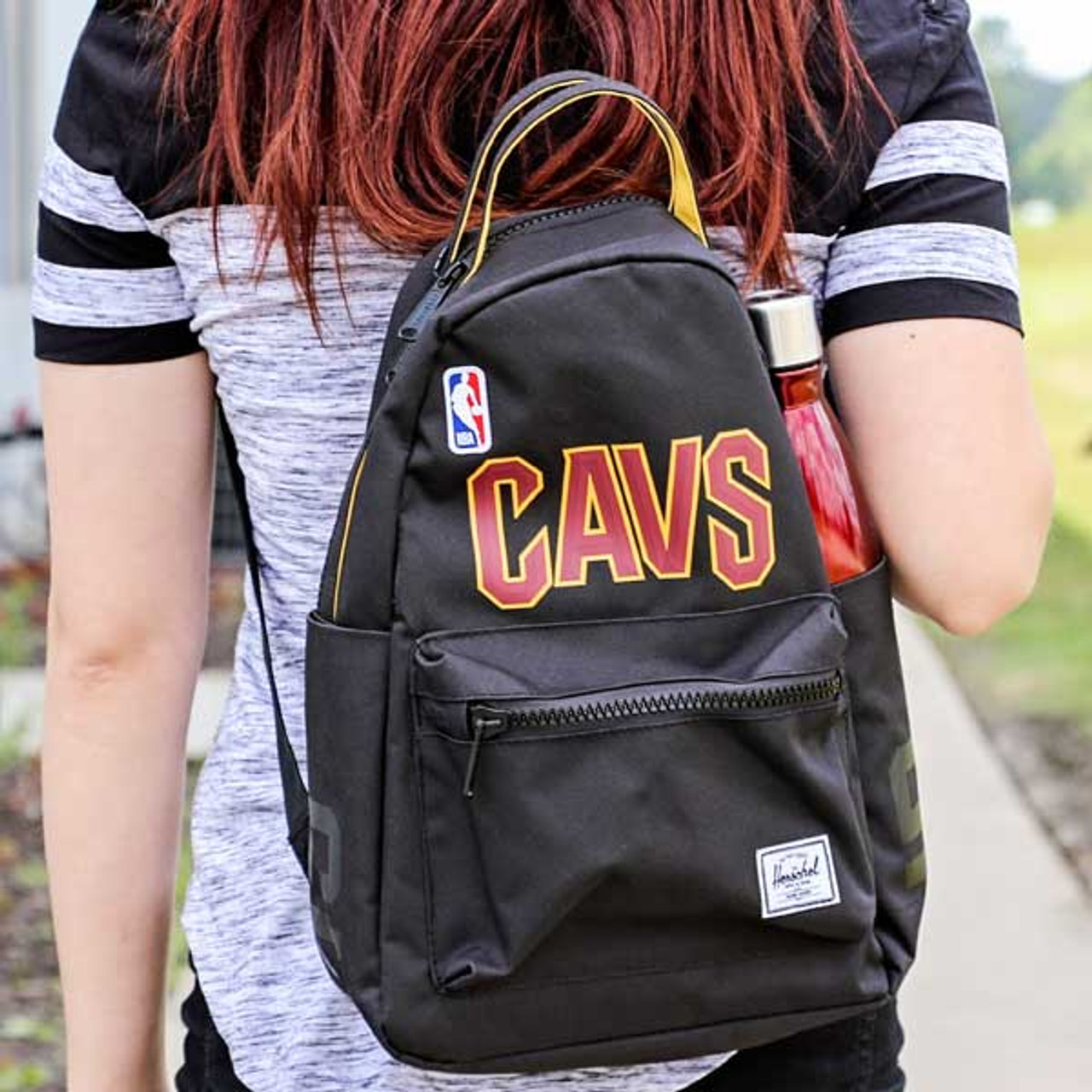 small black canvas backpack