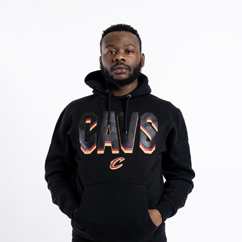 model wearing black cavs hoodie