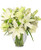 Pretty and delicate, this arrangement exemplifies the feelings of purity and peace. With white lilies, pale green roses, white waxflowers, and green button poms, Simplicity is an entrancing beauty full of grace. You can't go wrong with an arrangement this tasteful!

Copyright content provided by FlowerShopNetwork.com