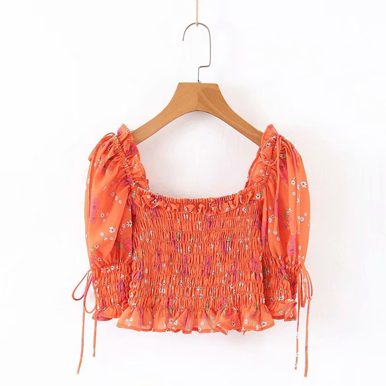 orange smocked top