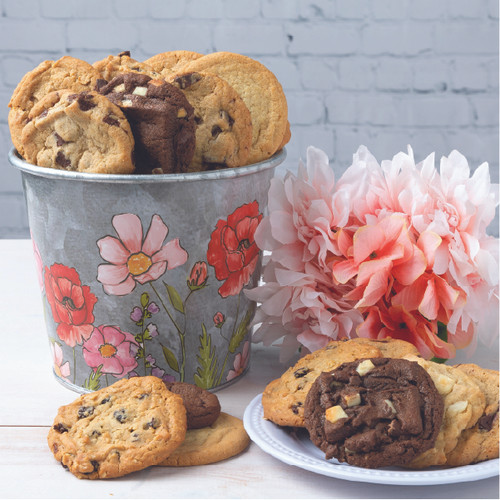 Metal poppy bucket filled with 18 freshly baked, individually wrapped gourmet cookies in assorted flavors, vibrant keepsake container perfect for thoughtful gifting and brightening any occasion.