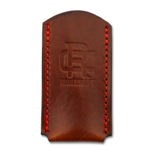 Front view of the RoseCraft Large Knife Slip in leather, showing the red stitching and embossed Locking RC logo. Front view of the RoseCraft Large Knife Slip in leather, showing the red stitching and embossed Locking RC logo.