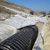 Non-woven geotextile over twinwall pipe.