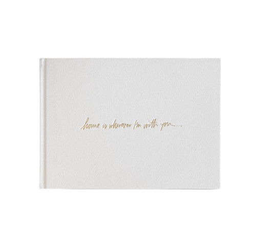 A beautiful linen cover with gold foil stamping "Home is whenever I'm with you"