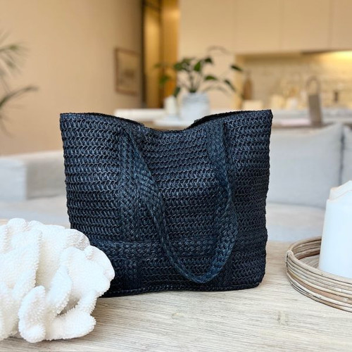 These beach bags have a Lucious look and feel. You'll be sorted with this beach bag, at 49 x 36cm. Perfect for all the beach bag must haves, sunblock, hats, water bottles, etc - Black.