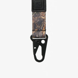 Close-up of Thread Realtree MAX-7 keychain clip showing sturdy clasp mechanism and camo strap detail.