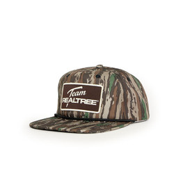 Angled view of Realtree Original camo flat bill hat with Team Realtree patch and rope detail main