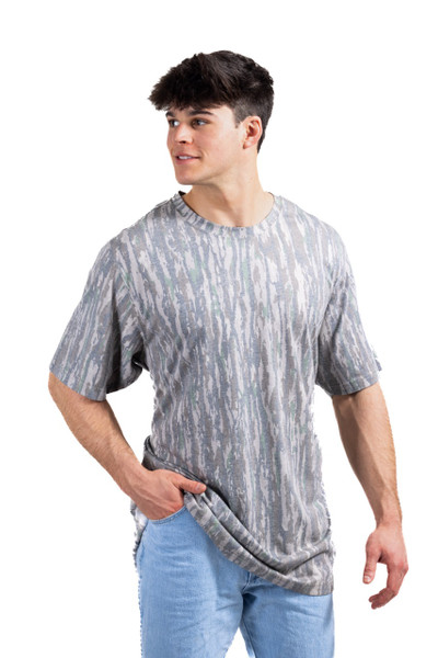 Model wearing Men's Tri Blend Short Sleeve Crew Neck Camo Shirt in Realtree Original, front angled view main