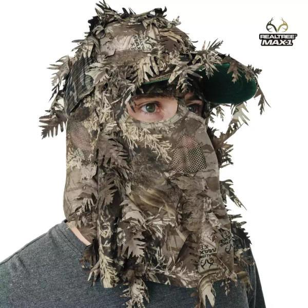 A Realtree MAX-1 QuikCamo leafy ball cap is displayed with the mask pulled down, demonstrating its 3D leaf overlays and breathable mesh face coverage.