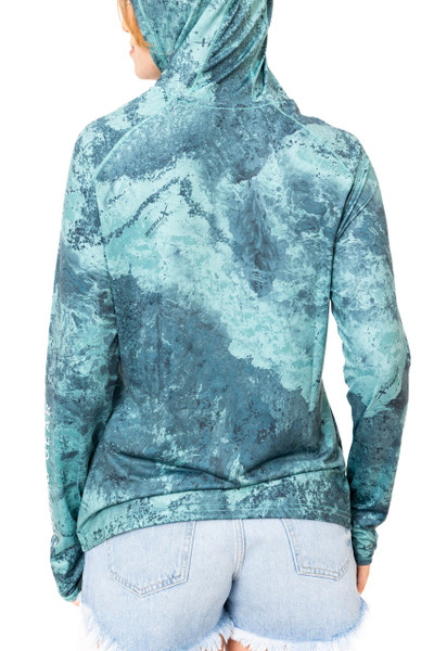 Back view of the Realtree Fishing Women’s XTREME Emerald Green Hooded Shirt with hood up, showing full-pattern coverage and garment length.