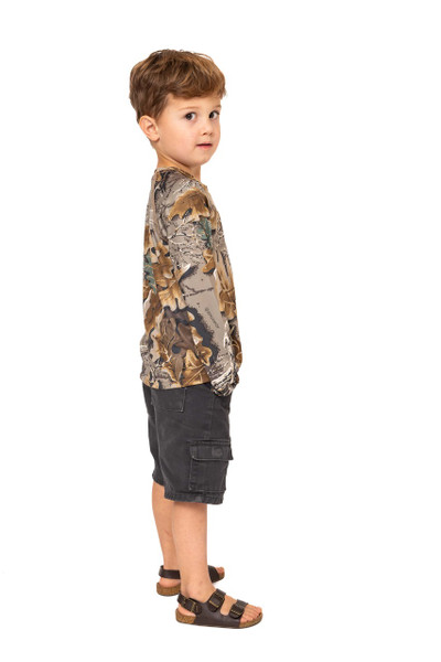 Angled side-back view of the kid’s long-sleeve Realtree Advantage Classic camo shirt, highlighting rear pattern coverage and relaxed fit.