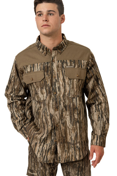 Men's Milk River Button Down Camo Shirt in Realtree Legacy shown from the front, featuring dual chest pockets and contrast shoulder panel main.